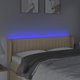 vidaXL Κεφαλάρι για κρεβάτι με LED, κρεμ, 147x16x78/88 εκ., ύφασμα