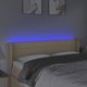 vidaXL Κεφαλάρι κρεβατιού με LED, κρεμ, 147x16x78/88 cm, ύφασμα